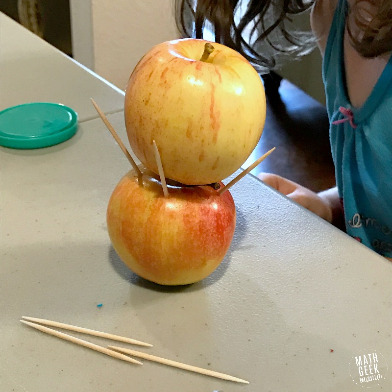 This fun apple STEM challenge will excite your kids. It's perfect for back to school or fall or to use along with the book, "Ten Apples Up On Top!"
